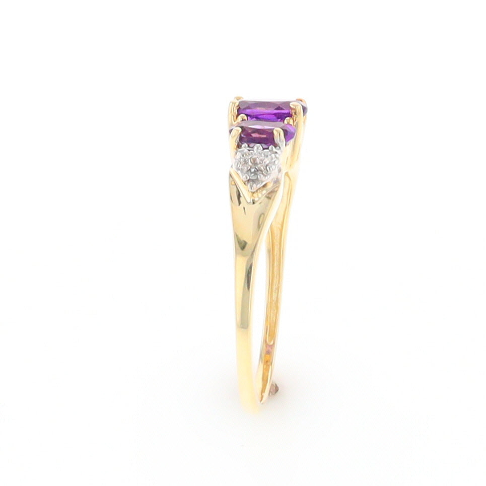 Three stone ring with amethyst