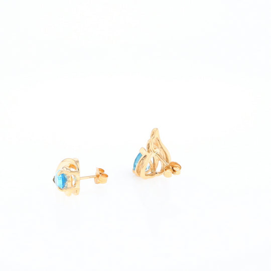 Blue Topaz Swirl Pear Stud Earrings