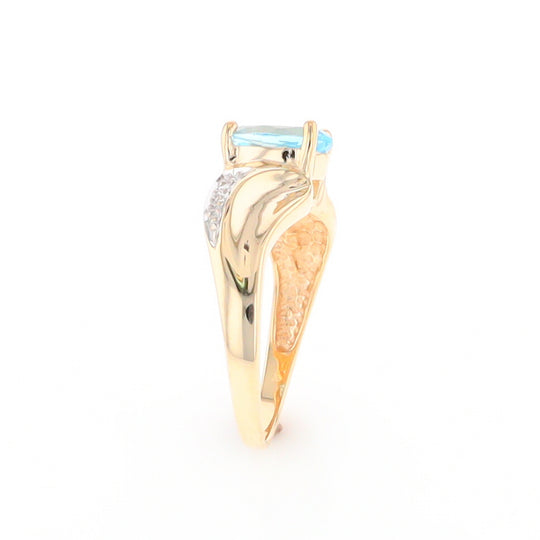 Blue Topaz Ring with Diamond Accents