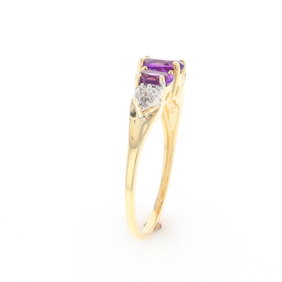 Three stone ring with amethyst