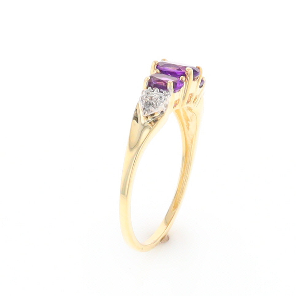 Three stone ring with amethyst