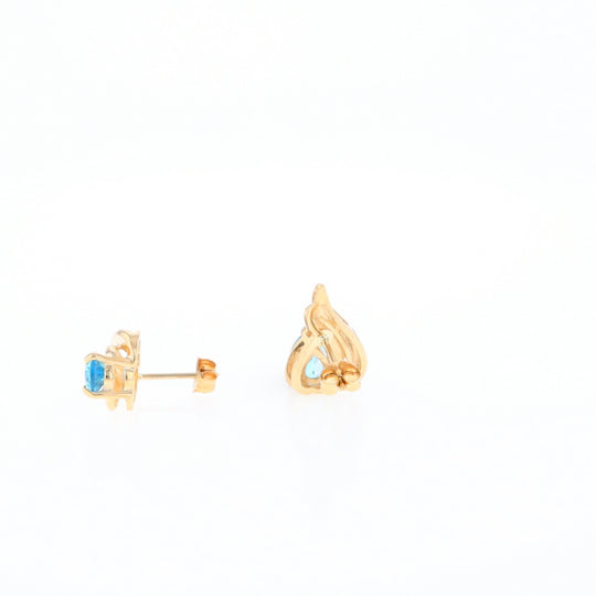 Blue Topaz Swirl Pear Stud Earrings