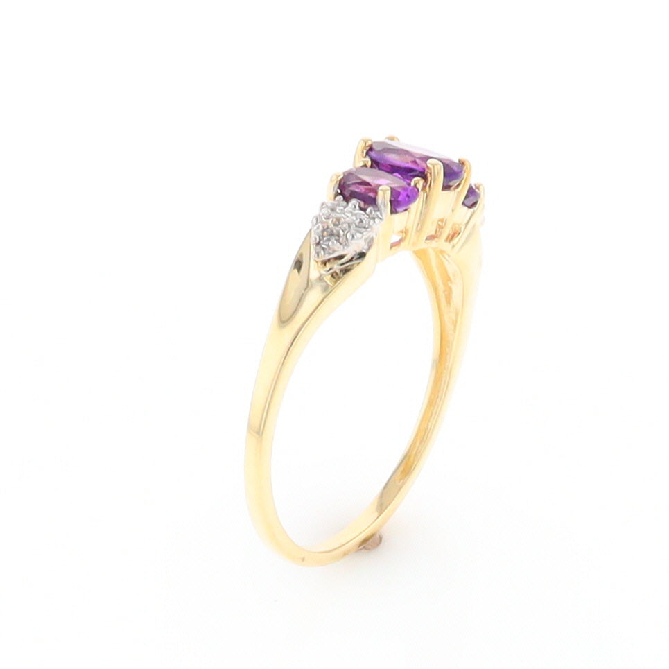 Three stone ring with amethyst