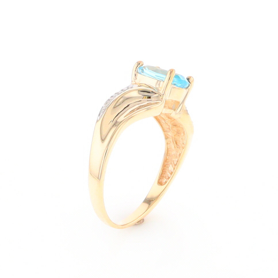 Blue Topaz Ring with Diamond Accents