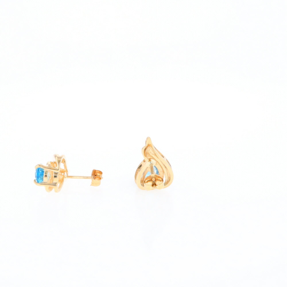 Blue Topaz Swirl Pear Stud Earrings