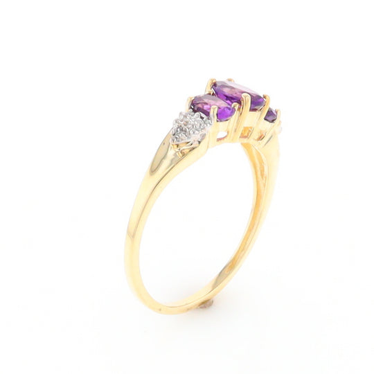 Three stone ring with amethyst