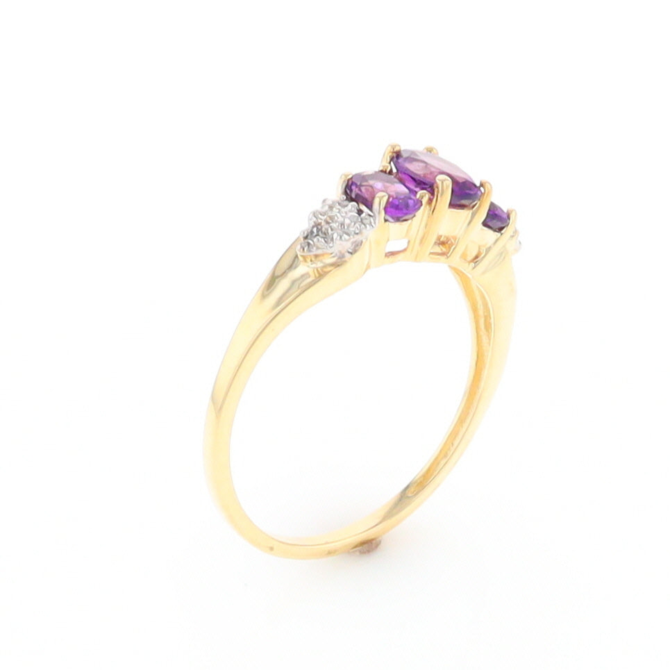 Three stone ring with amethyst