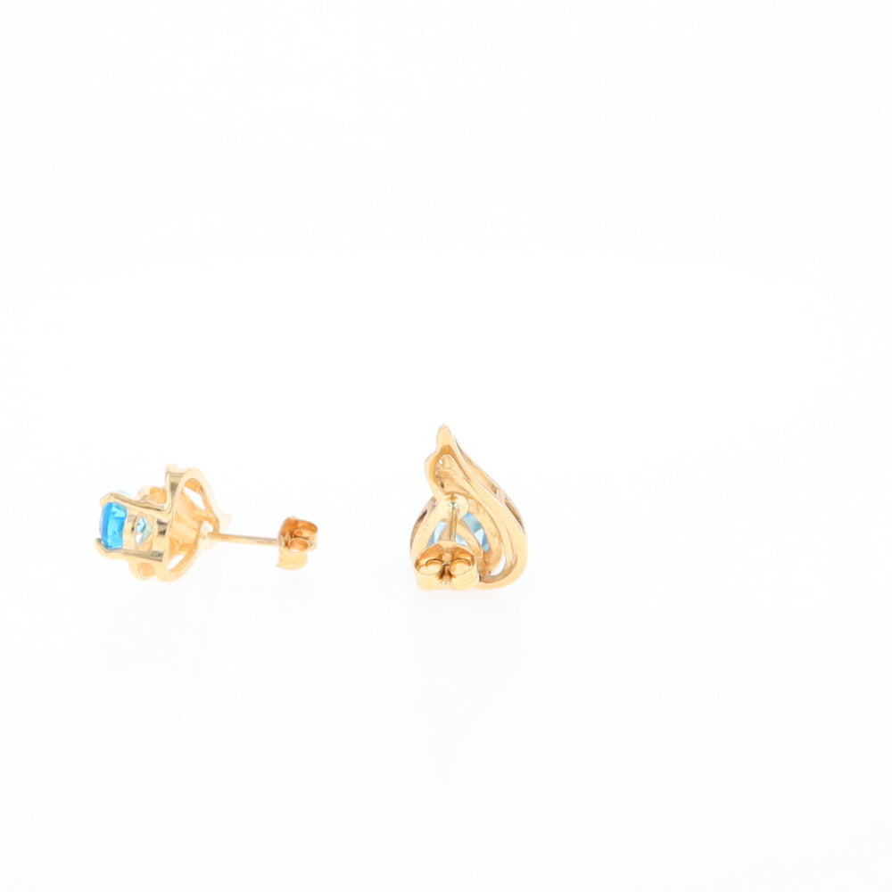 Blue Topaz Swirl Pear Stud Earrings