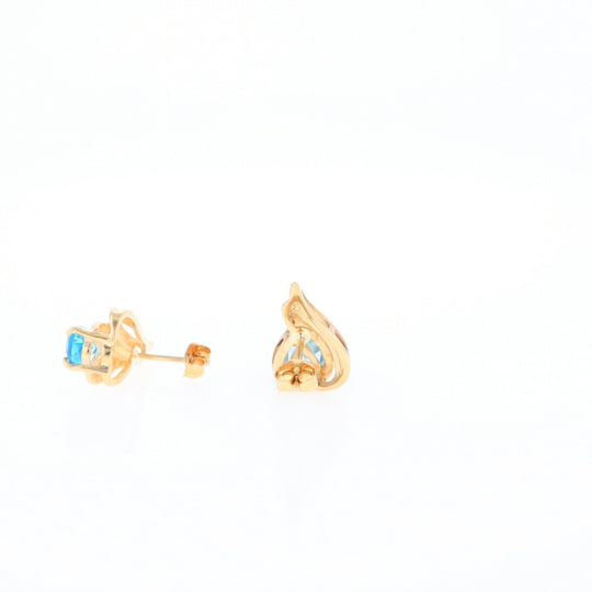 Blue Topaz Swirl Pear Stud Earrings