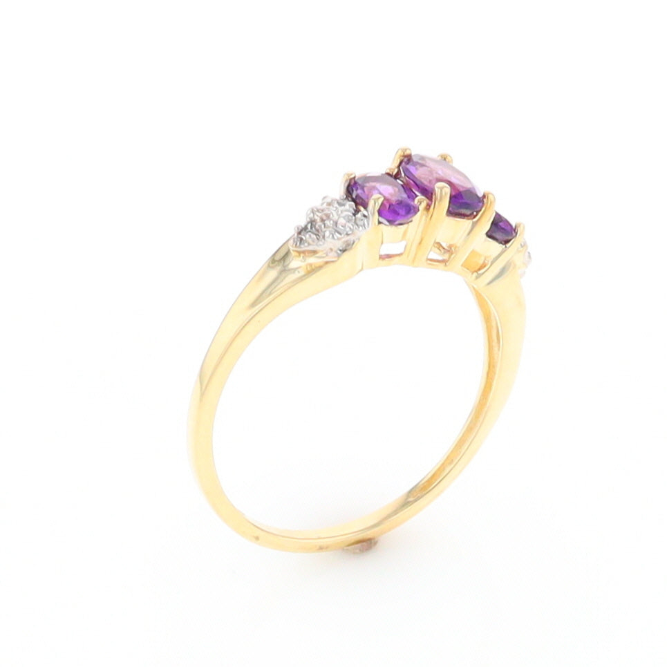 Three stone ring with amethyst