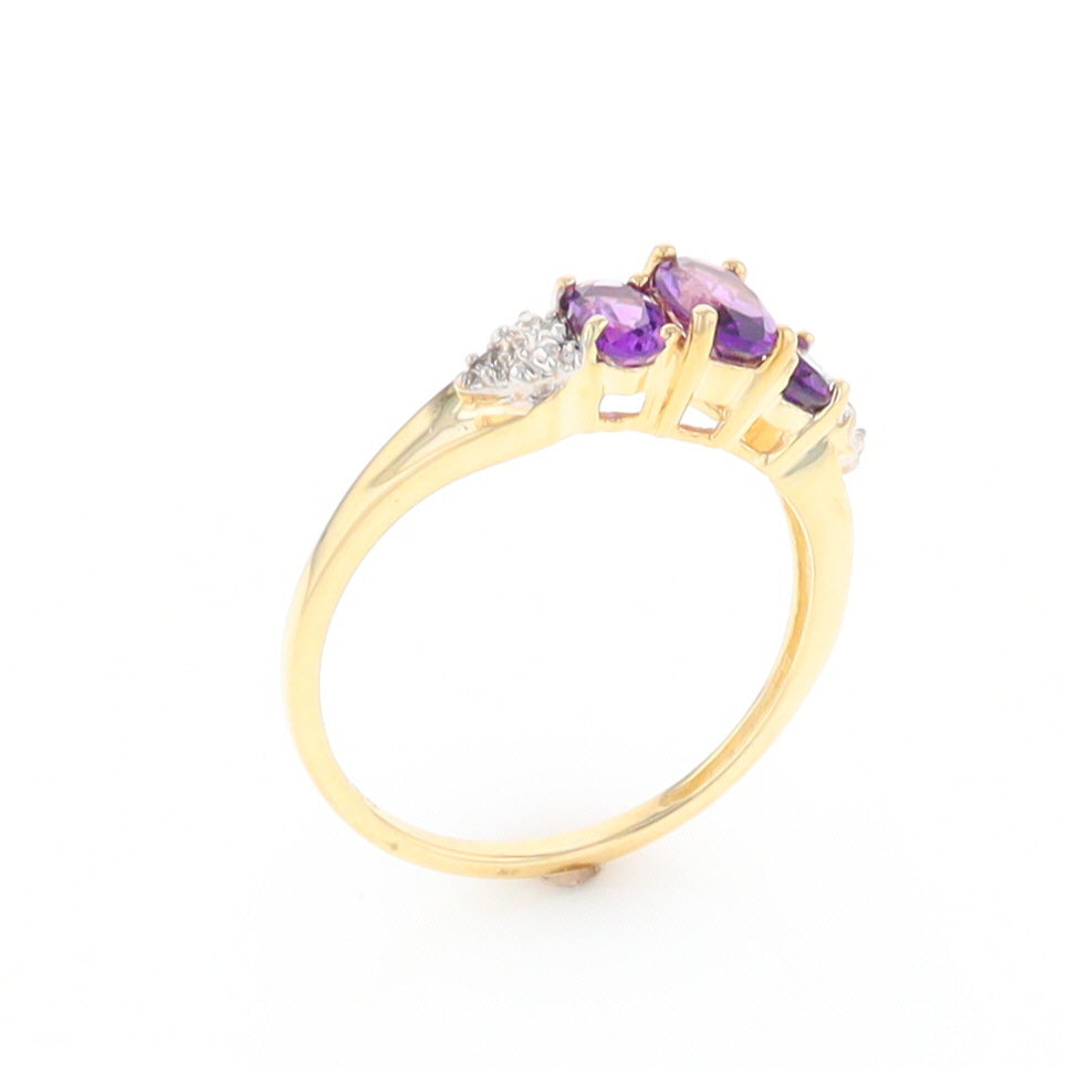 Three stone ring with amethyst