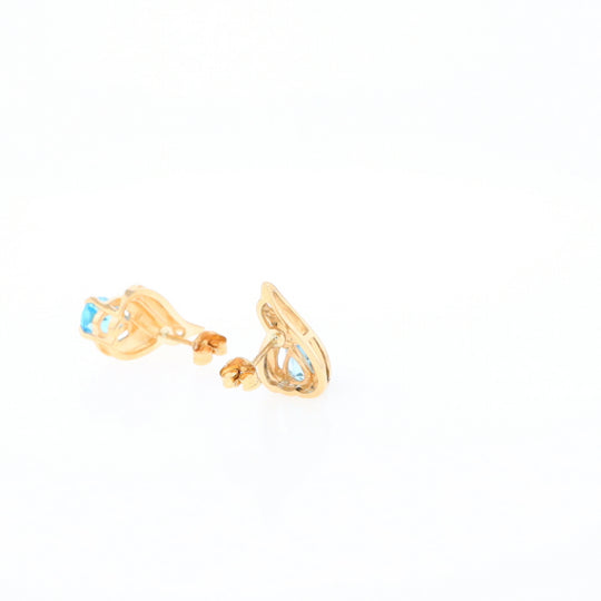 Blue Topaz Swirl Pear Stud Earrings