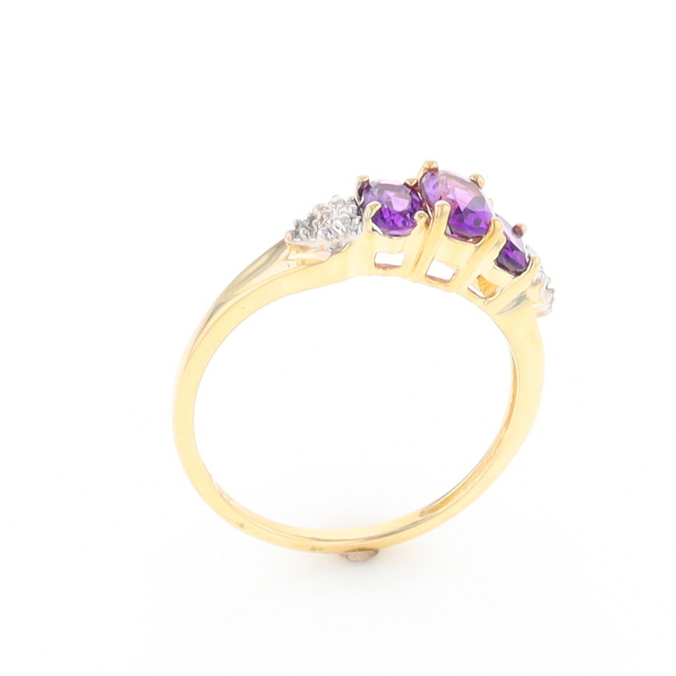 Three stone ring with amethyst