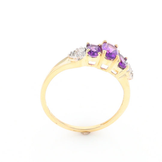 Three stone ring with amethyst