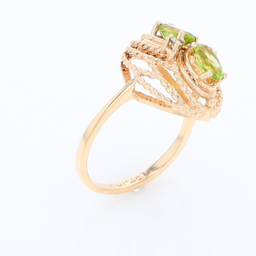 Two Oval Peridot and Diamond Rope Design Gold Ring
