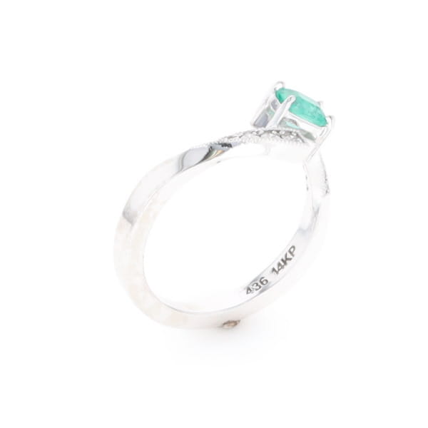 Emerald Twist Ring with Diamond Accents