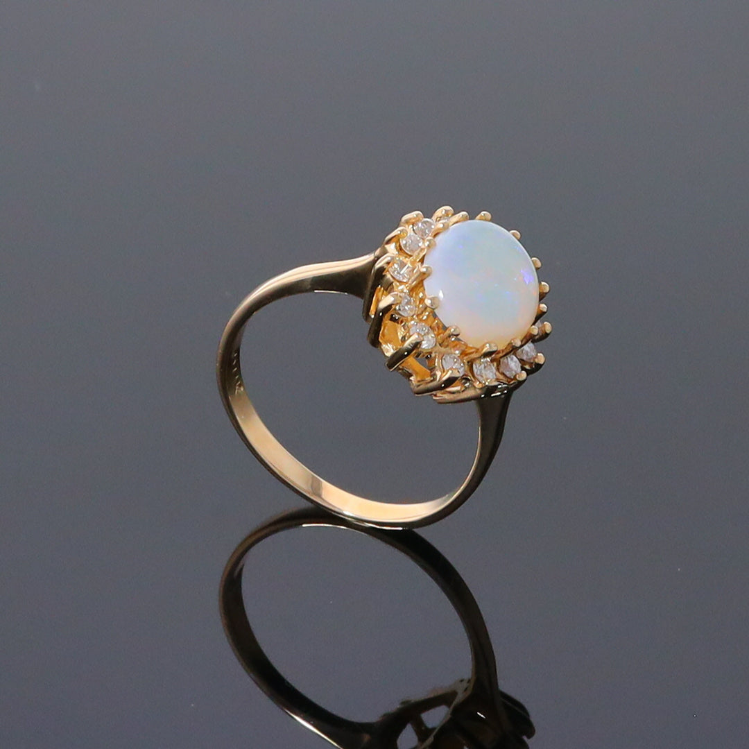 Oval Cabochon Opal with Diamond Halo Ring