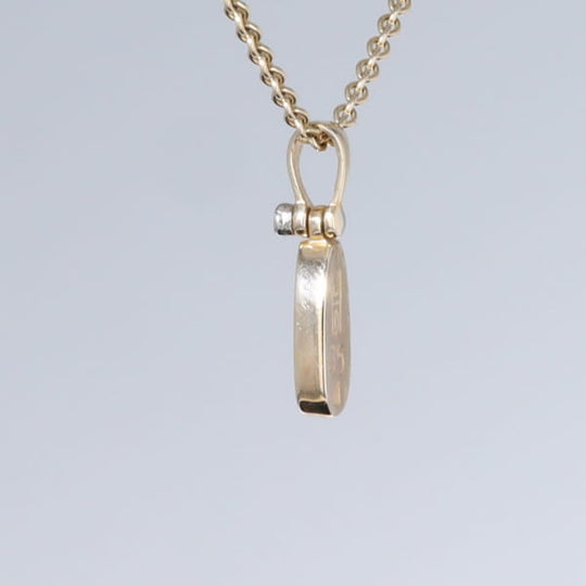 Opal Pendant Oval Inlaid Design with .02ct Round Diamond