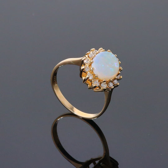 Oval Cabochon Opal with Diamond Halo Ring