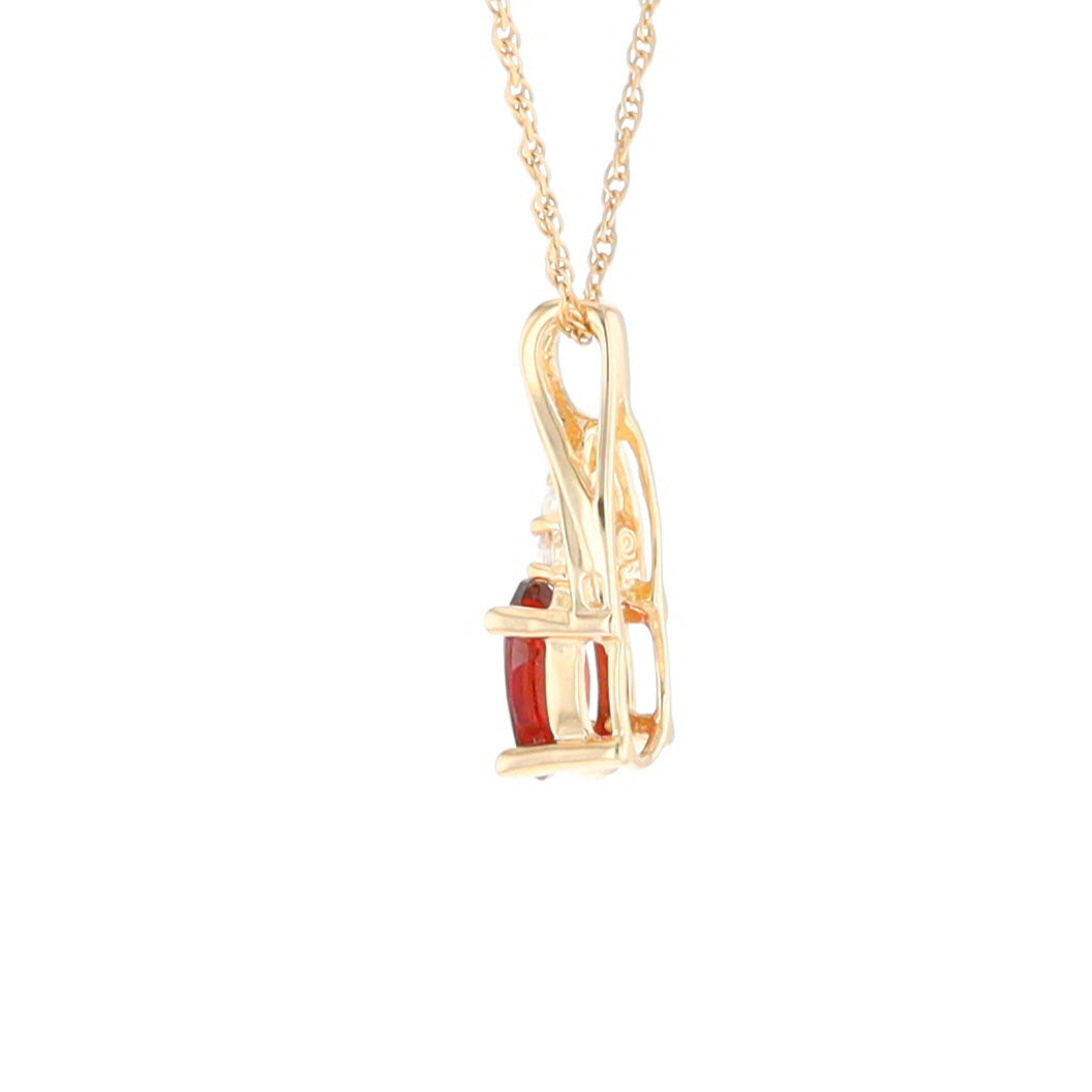 Oval Garnet Pendant with Cubic Zirconia Accents