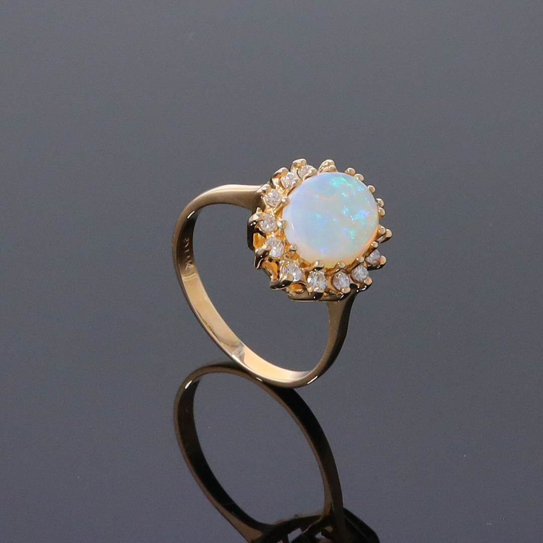 Oval Cabochon Opal with Diamond Halo Ring