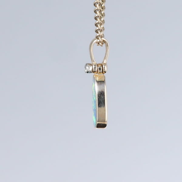 Opal Pendant Oval Inlaid Design with .02ct Round Diamond