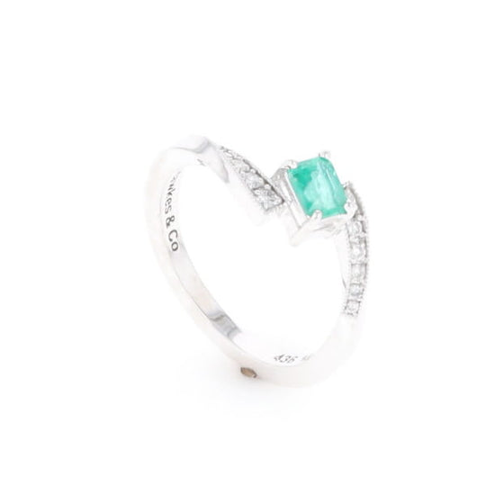 Emerald Twist Ring with Diamond Accents