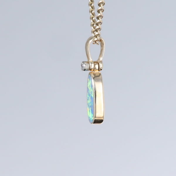 Opal Pendant Oval Inlaid Design with .02ct Round Diamond
