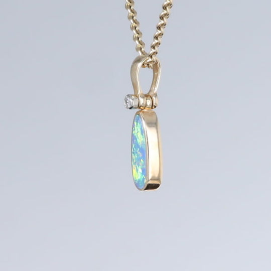 Opal Pendant Oval Inlaid Design with .02ct Round Diamond