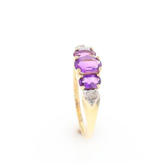 Three stone ring with amethyst