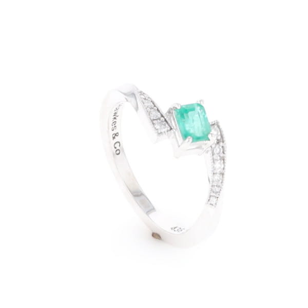 Emerald Twist Ring with Diamond Accents