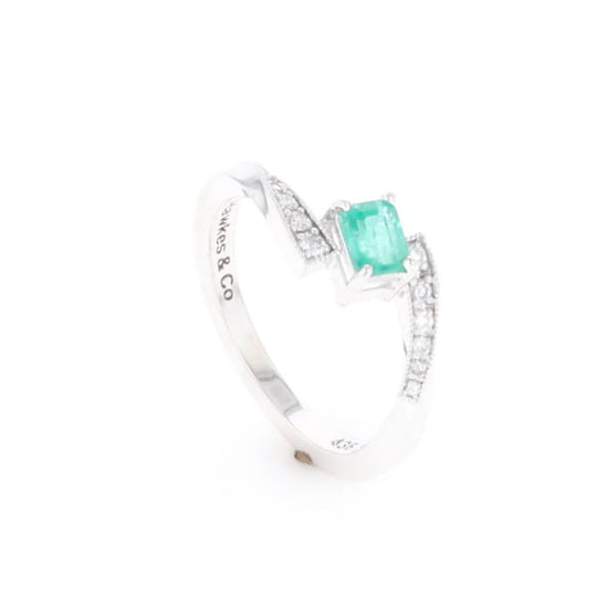 Emerald Twist Ring with Diamond Accents