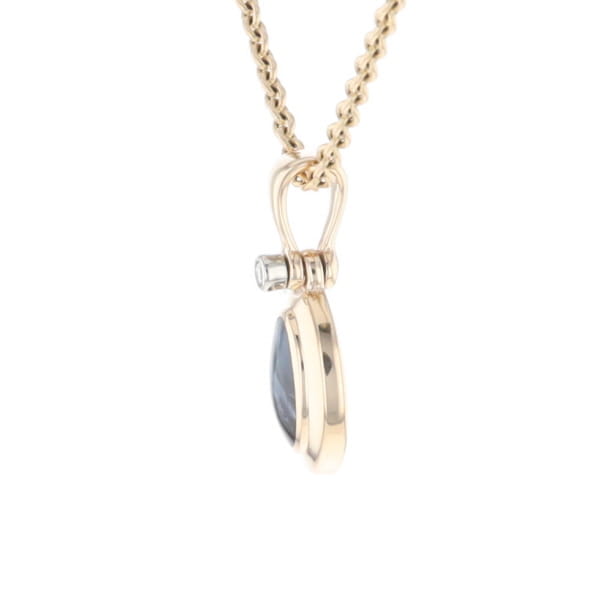 Natural pietersite oval inlaid .02ctw diamond pendant