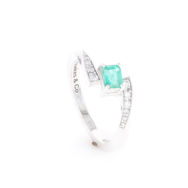 Emerald Twist Ring with Diamond Accents
