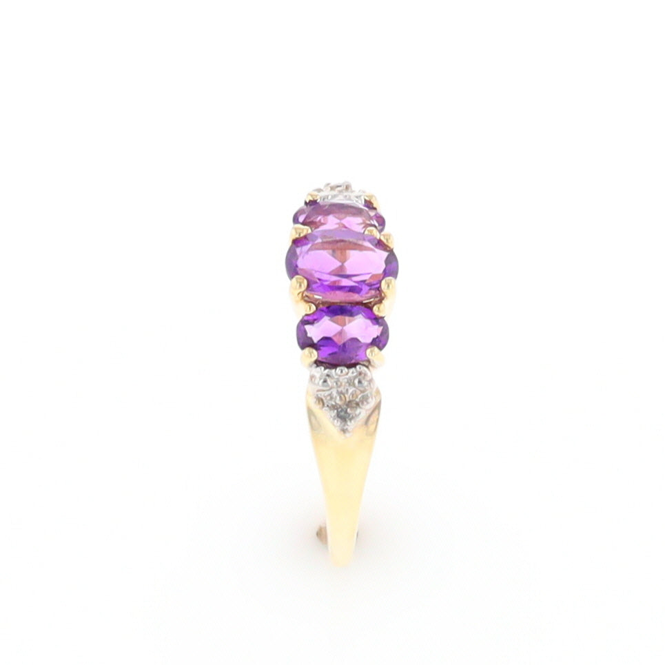 Three stone ring with amethyst