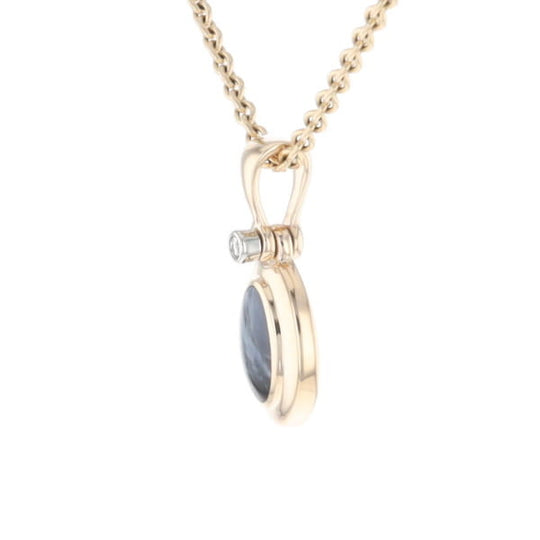 Natural pietersite oval inlaid .02ctw diamond pendant