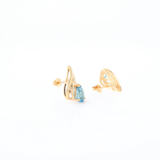 Blue Topaz Swirl Pear Stud Earrings