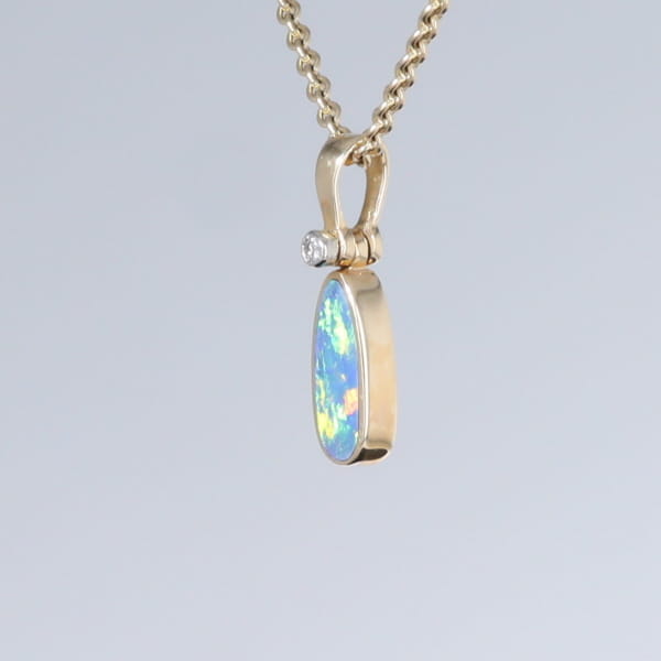 Opal Pendant Oval Inlaid Design with .02ct Round Diamond