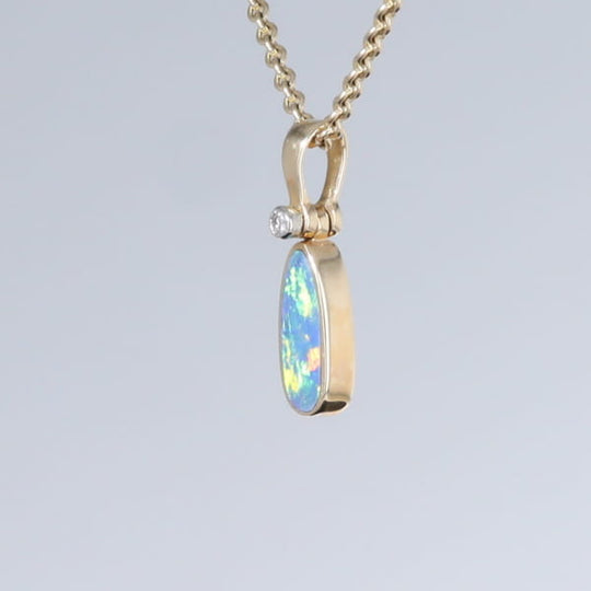 Opal Pendant Oval Inlaid Design with .02ct Round Diamond