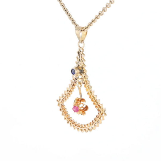 Vintage Buttercup Dangle Ruby Scrollwork Pendant