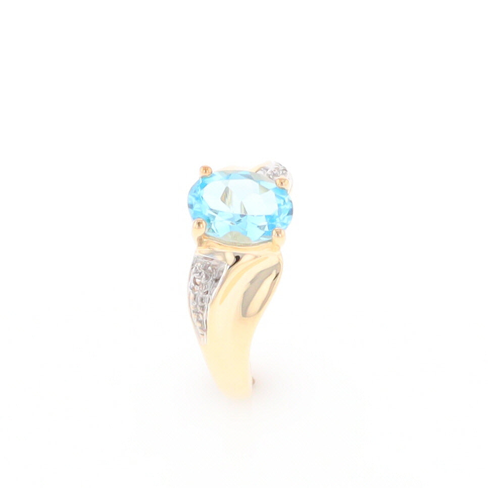 Blue Topaz Ring with Diamond Accents