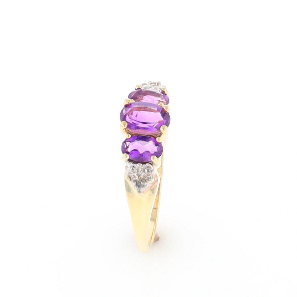 Three stone ring with amethyst