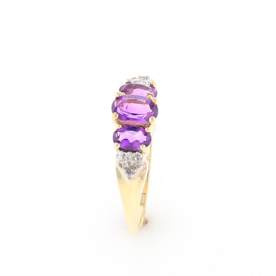 Three stone ring with amethyst