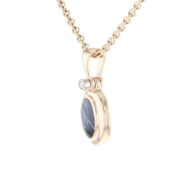 Natural pietersite oval inlaid .02ctw diamond pendant