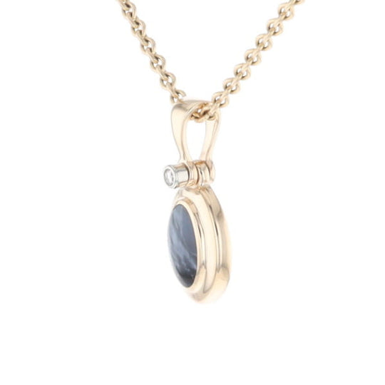 Natural pietersite oval inlaid .02ctw diamond pendant