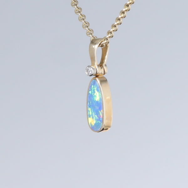 Opal Pendant Oval Inlaid Design with .02ct Round Diamond