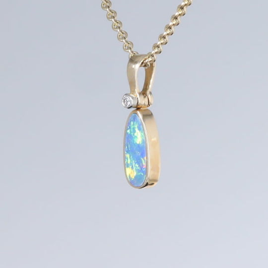 Opal Pendant Oval Inlaid Design with .02ct Round Diamond