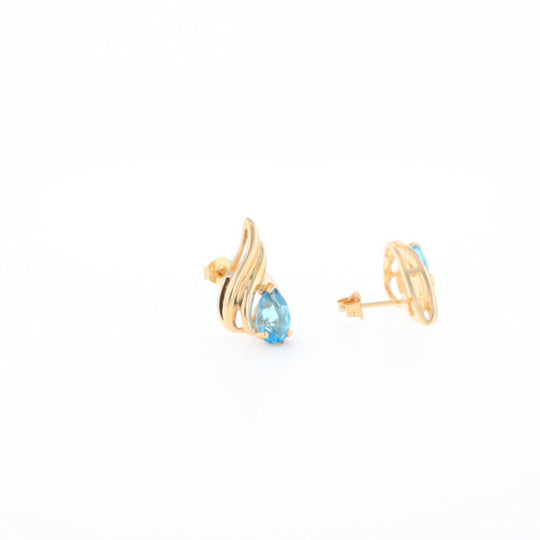 Blue Topaz Swirl Pear Stud Earrings