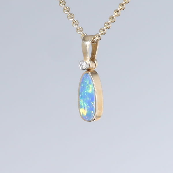 Opal Pendant Oval Inlaid Design with .02ct Round Diamond