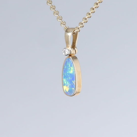 Opal Pendant Oval Inlaid Design with .02ct Round Diamond